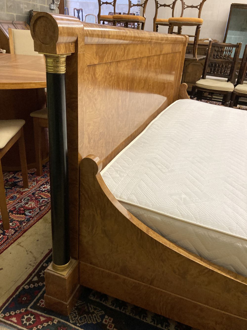 An Empire style birds eye maple gilt metal mounted and part ebonised Superking 6ft. bed frame and mattress